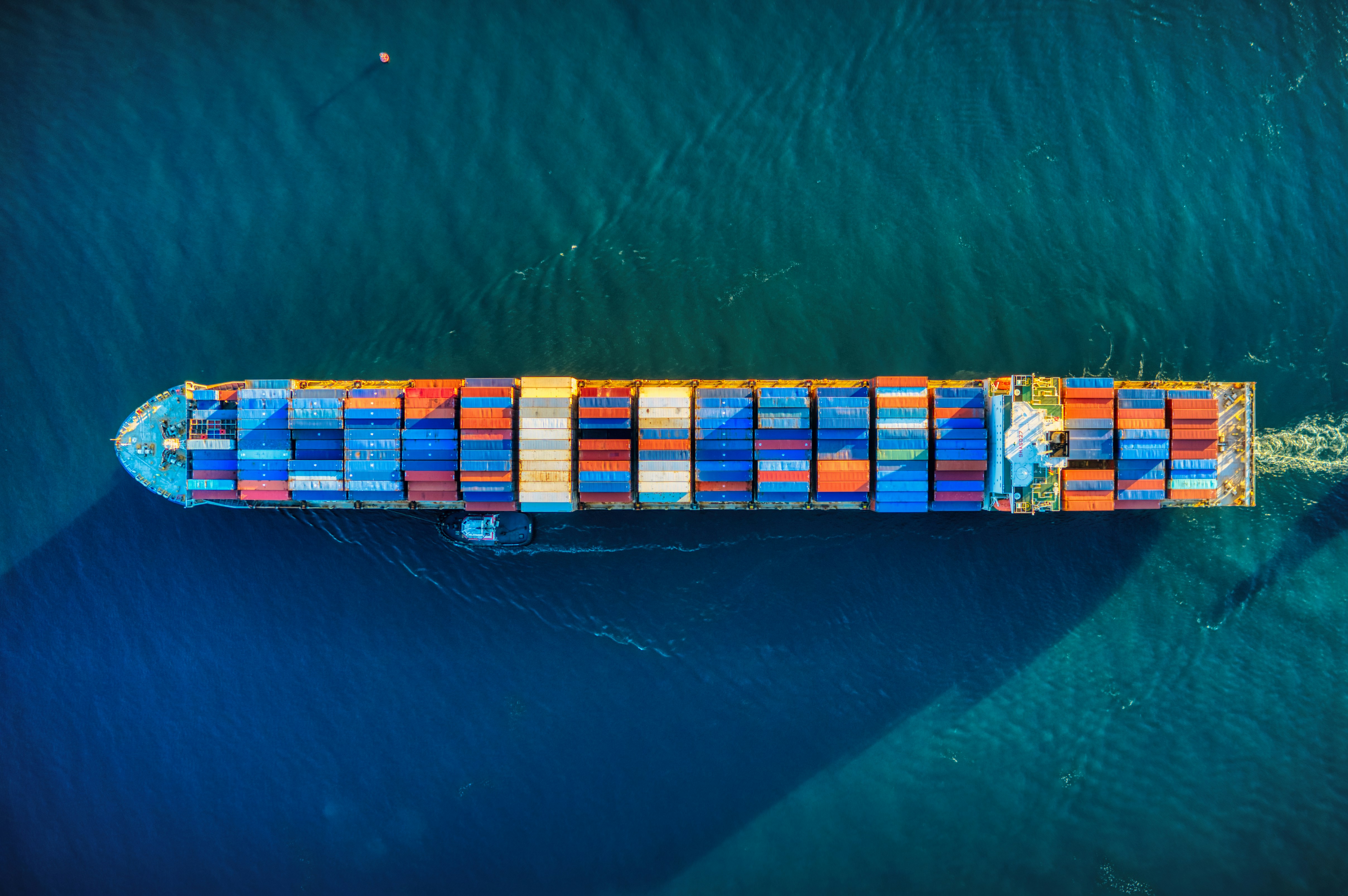 Container ship carrying mixed cargo for international shipment